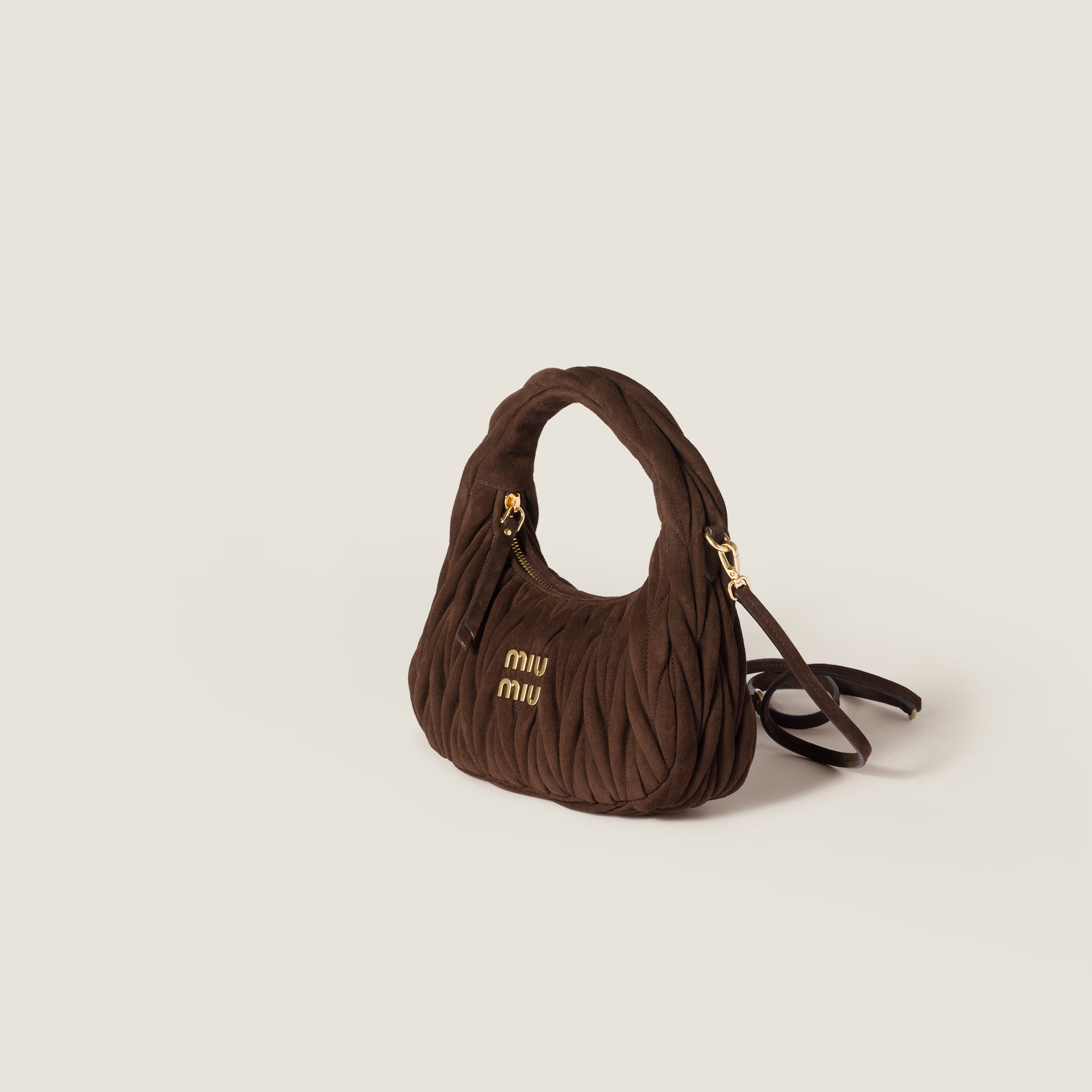Wander matelassé suede bag