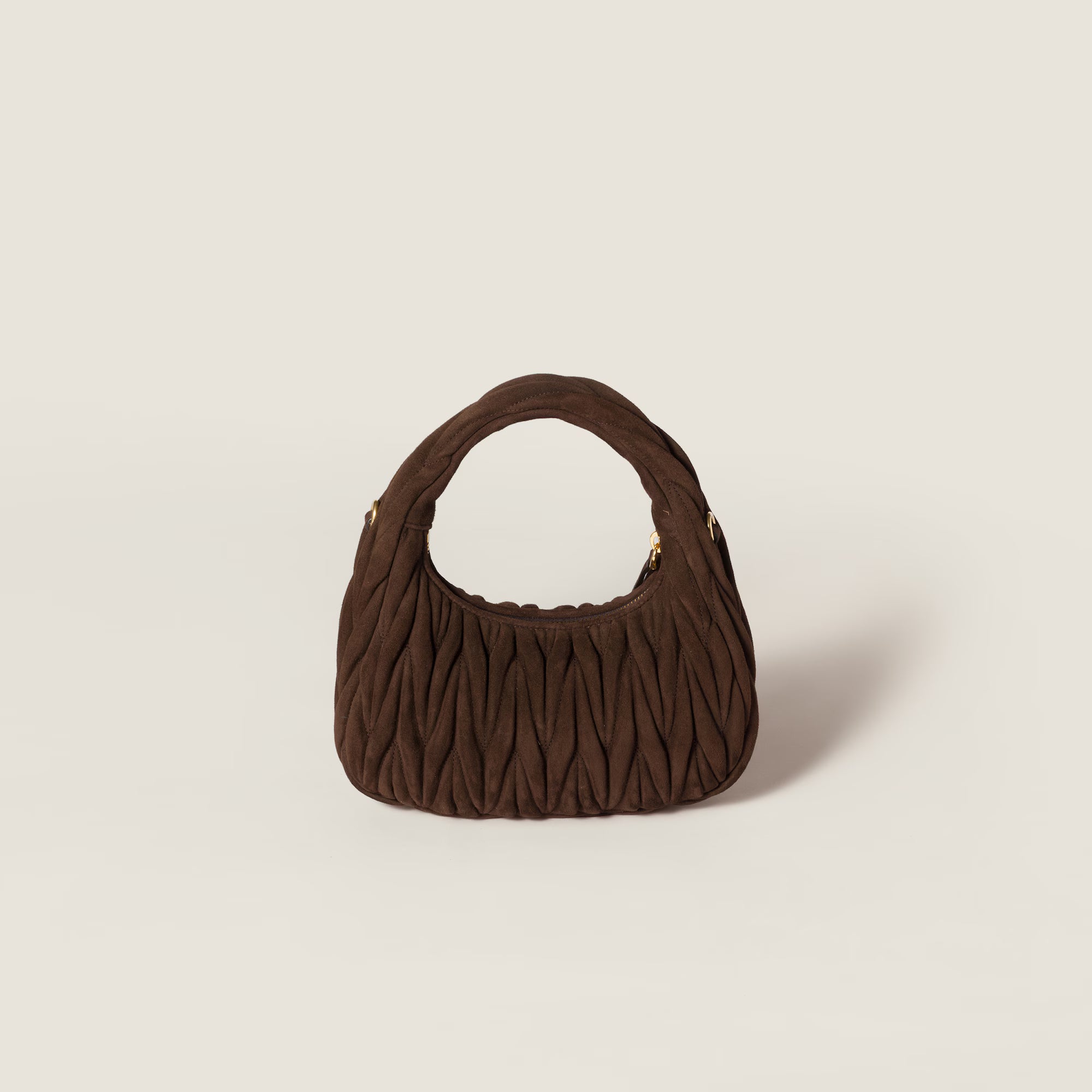 Wander matelassé suede bag