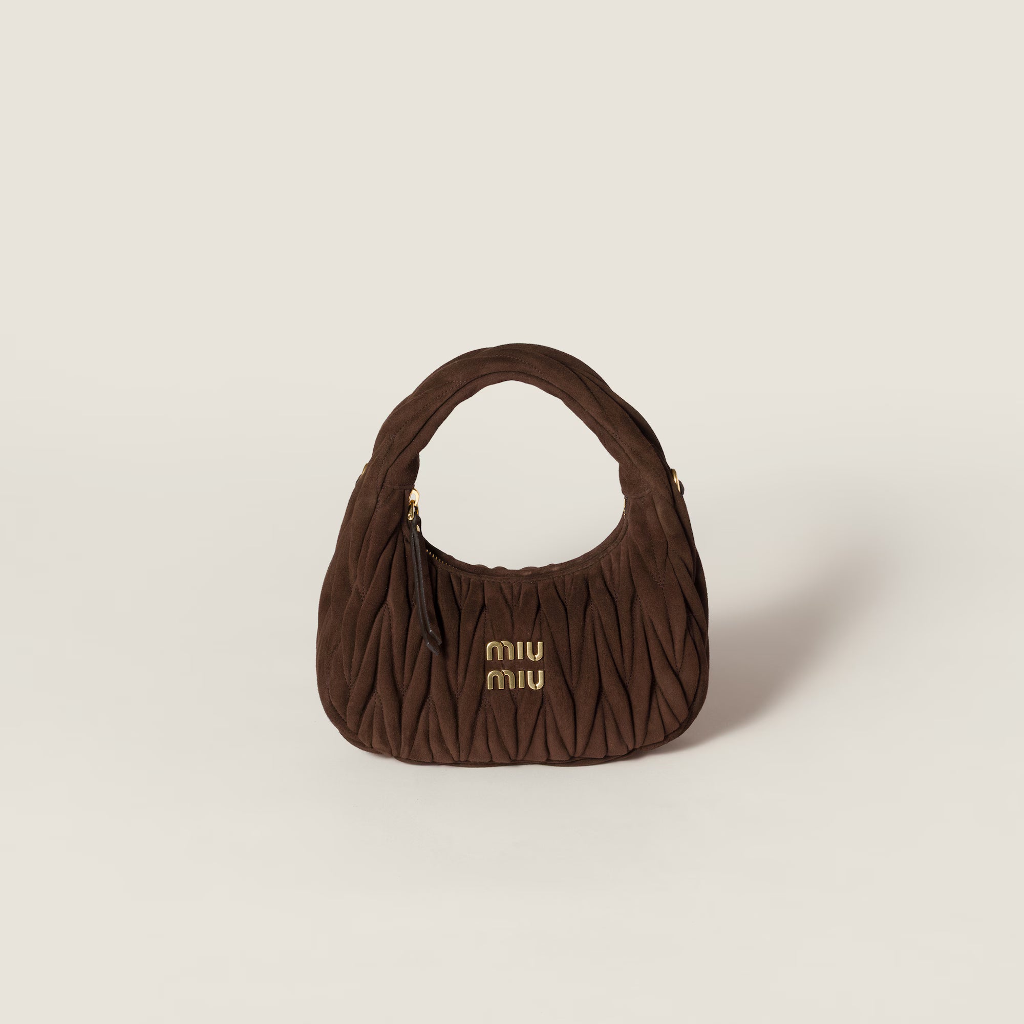 Wander matelassé suede bag